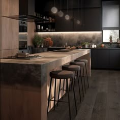 an image of a modern kitchen setting with bar stools and wood flooring in it