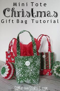 three small christmas bags sitting next to each other on top of a wooden table with text overlay that says mini tote christmas gift bag