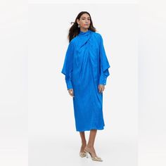 - Size S - Nwt - Blue - Long Sleeve - Buttons On Sleeves - Bow In Rear - May Fit A Medium - Oversized Style - Beautiful Kaftan Design Oversized Blue Midi Dress, Elegant Oversized Blue Dress, Chic Oversized Blue Dresses, Oversized Blue Midi Dress For Spring, Chic Blue Dress By H&m, Chic Blue H&m Dress, Gold Satin Dress, Kaftan Design, Bohemian Mini Dress