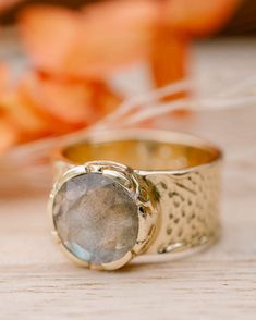 Highlighting our Jocelyn Ring, featuring a beautiful rainbow labradorite stone and plated with gold 🤩 Brass Stackable Jewelry For Anniversary, Stackable Brass Jewelry For Anniversary, Brass Round Band Jewelry Gift, Hammered Recycled Gold Ring, Heirloom Faceted Gold Jewelry, Gold Faceted Moonstone Ring, Faceted Gold Moonstone Ring, Gold Ring With Bezel Setting, Gold Hammered Ring Jewelry