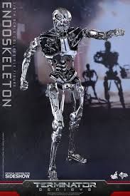 a silver robot is standing in front of a camera