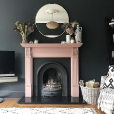 a living room filled with furniture and a fire place