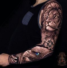 a man with a lion tattoo on his arm