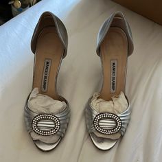 Manolo Blahnik Silver Heels Size 35 Worn Twice For Weddings. Note Small Damage On Multiple Spots To Right Heel, See Photo Posted Runs True To Size And Very Comfortable For Long Wear. Shoes Manolo Blahnik, Blahnik Shoes, Manolo Blahnik Shoes, Silver Heels, Manolo Blahnik, Shoes Women Heels, Shoes Heels, Weddings, Women Shoes