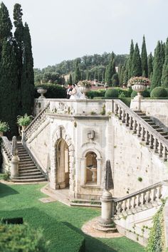 an outdoor area with stairs and trees in the background