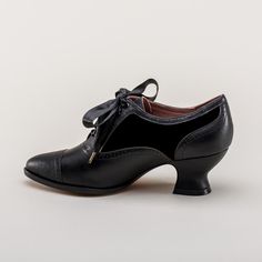 It's hard to go wrong with leather and velveteen, and the Lucille oxfords pair the two perfectly. Made on our best-selling and most beloved Edwardian oxford last and heel, the Lucille Edwardian Oxfords are perfect for the turn of the 20th century all the way through the mid-1920s, but try them with modern attire and aesthetics as well, such as Cottagecore, Lolita, and Gothic outfits. Materials & Sizing Calf leather and velveteen upper Adjustable satin ribbon lace-up closure Leather lining Le Vintage Black Oxford Lace-up Shoes, Classic Black Low Heel Lace-up Shoes, Low Heel Lace-up Shoes With Leather Sole For Work, Pointed Toe Leather Shoes For Fall Derby, Leather Shoes With Rubber Heel Cap For Work, Fall Semi-formal Oxfords With Leather Sole, Black Pointed Toe Oxfords With Leather Sole, Semi-formal Fall Oxfords With Cap Toe, Fall Derby Cap Toe Oxfords