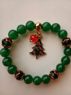 Christmas tree charm bracelet Affordable Silver Christmas Bracelets, Affordable Silver Christmas Bracelet, Disney Bead Bracelet December, Christmas Beaded Bracelets Patterns, Christmas Colors Jewelry, Cheap Holiday Bracelets With Round Beads, Polymer Clay Christmas Bracelet, Christmas Bracelets Rave, Christmas Beaded Bracelets Tutorial