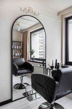 a mirror and chair in a room