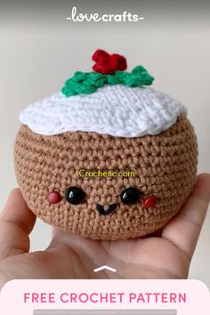 a crocheted cupcake is shown in the shape of a hand