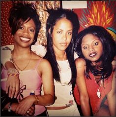 three young women posing for a photo together