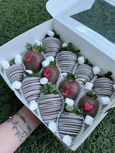 chocolate covered strawberries with marshmallows in a box