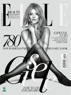 a woman sitting on top of a magazine cover with her legs crossed and wearing stockings