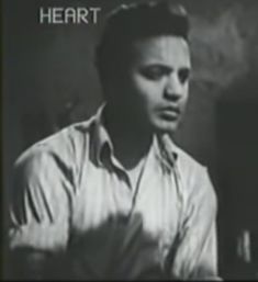 a black and white photo of a young man