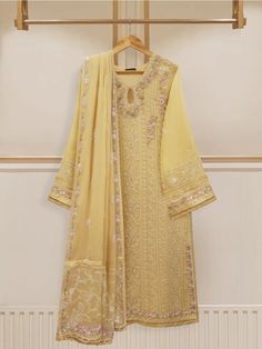 Introducing our elegant embroidered chiffon shirt with dupatta a perfect choice for those who appreciate intricate detailing and graceful style. Crafted from high-quality chiffon fabric, this shirt offers a lightweight and luxurious feel, allowing you to feel comfortable and chic throughout the day. The set comes with a matching dupatta which enhances the overall look and adds a touch of finesse to your outfit. Length: 45" Dupatta Fabric: Chiffon Unstitched Chiffon Suit With Dabka Work, Elegant Georgette Dupatta With Floral Embroidery, Elegant Floral Embroidered Chinon Kurta, Elegant Floral Embroidered Georgette Dupatta, Eid Chiffon Lawn Suit With Resham Embroidery, Eid Chiffon Unstitched Suit With Resham Embroidery, Eid Chiffon Unstitched Suit With Dabka Work, Eid Lawn Suit With Resham Embroidery In Chiffon, Elegant Lawn Suit With Intricate Embroidery In Cambric