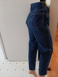 "Vintage Womens High Waist Curvy Fit Tapered Leg Mom Jeans Size 10/M Excellent Vintage Condition. No Rips, Tears Or Stains. Shows Little Wear Wrangler Label, Size Tag Removed. Best fit Womens M But Please Check Measurements Dark Wash Wranglers High Waist Curvy Fit Tapered Legs Pockets/Metal Zipper/Bronze Button Roomy Through The Thighs Waist 29\" Inseam 29.5\" Hips 43\" Rise 13\" Thighs 25\" Tapered Hem 13\"" Coverall Jumpsuit, Fit Womens, Jeans Mom, Fit Mom, Metal Zipper, Tapered Legs, Distressed Denim, Size Tag, Mom Jeans