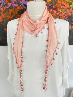 Cotton scarf. All edges are hand crocheted with beads. Can be used as a necklace, necktie or bandana. Produced in pet and smoke free environment. Please wash by hand with warm water and soap.  Fabric length 1.5 meters (59inch)               widest part 22cm (8,66inch)             +-3 cm. There is five different ways to tie, as shown in the last picture. As one of my customer says; It is feminine & feels as light as a feather around my neck. The beads and disks are very appealing as they sparkle with movement and in light. I am going to love wearing this scarf and will wear it with jeans, dresses & business suits. Beautiful! Thanks so much.  EXPRESS Shipping Upgrade for 4+ pieces   Buy at least 4 pieces, I will send your order by express delivery service instead of airmail post and it arriv Beaded Scarf, Scarf Necklace, Pink Scarves, Business Suit, Cotton Scarf, Business Dresses, Hand Crochet, Handmade Necklaces, Scarf Wrap