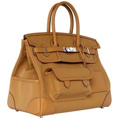 1stDibs Exclusives From Three Over Six Brand: Hermès Style: Birkin "Cargo" Limited Edition Size: 35cm Color: Sesame Leather: Swift & Canvas Hardware: Palladium Year: 2020 Y Condition: Pristine, never carried: The item has never been carried and is in pristine condition complete with all accessories. Accompanied by: Hermès box, dustbag, clochette, two keys, lock, raincoat, detachable cup holder, card wallet, felt protector and leather care booklet Hermes Birkin Handbags, Birkin Handbags, Hermes Birkin 35, Luggage Bags Travel, Hot Bags, Handbags And Purses, Kelly Bag, Vintage Hermes, Jane Birkin