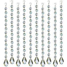 a line of crystal beads hanging from hooks on a white background with clippings