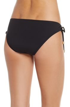 Classic bikini bottoms are charmed by bead-tipped ties at the sides that adjust to the perfect fit and look for you. Full back coverage Lined 83% nylon, 17% elastane Hand wash, line dry Imported Black Tie-side Swimwear With Side Ties, Adjustable Side Ties Swim Bottoms, Black Swimwear With Side Ties For Swimming, Black Swimwear With Side Ties, Adjustable Tie-side Pool Bottoms, Adjustable Black Beachwear Bottoms, Adjustable Black Tie-side Bottoms, Perfect Fit, Nordstrom