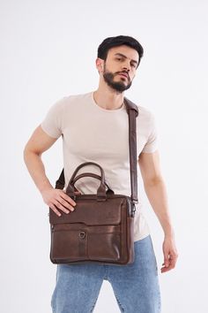 - Our product is 100% genuine leather. - It is produced in master hands with quality materials and delicate handwork. - Dimensions 29 x 39 cm Formal Brown Soft Leather Satchel, Textured Leather Laptop Bag For Everyday Use, Textured Leather Briefcase For Everyday Use, Luxury Brown Shoulder Bag For Business, Everyday Textured Leather Laptop Bag, Modern Cognac Leather Laptop Bag, Brown Professional Satchel For Formal Use, Luxury Leather Laptop Bag With Smooth Grain, Leather Briefcase With Smooth Grain For Daily Use