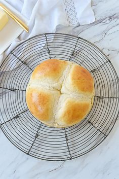 a loaf of bread sitting on top of a wire rack