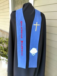 "Many churches have a tradition of using stoles for Confirmation. This stole was commissioned by a customer, and is a good representation of symbols you might choose for your own custom stole for such a special occasion! A variety of fabric and colors are available. The stole pictured is 35\" long measured from the back of the neck, and 5\" wide. PLEASE BE SURE TO SPECIFY YOUR CUSTOM MEASURMENTS! I have many religious designs to choose from if the ones pictured are not your taste. Please contact Lutheran Confirmation, Face Mug, Church Ideas, First Holy Communion, Blue Scarf, Holy Communion, One Pic, Clothing Items