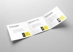 an open trifold brochure is shown on a gray surface with yellow accents