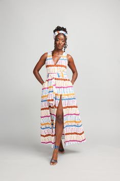 Style#1126WNA The Tinashe Women's Maxi Dress, showcasing the vivid White Nautical Adire print featuring pops of blue, orange, and yellow; masterfully blends the beauty of African-inspired motifs with the grace of a flowing silhouette. Ideal for standing out at summer gatherings, it's designed to enchant and allure, making sure all eyes are on you. Shop the matching items. *The dress you receive may vary slightly from the product image. It is the same fabric but may be cut in a different section African Print Maxi Dress, Maxi Dress White, Summer Gathering, Stylish Mom, Women Maxi, All Eyes, The Grace, African Inspired, White Maxi Dresses