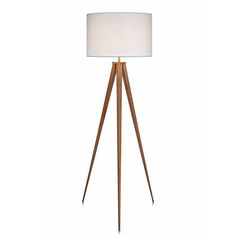 a wooden tripod floor lamp with a white shade