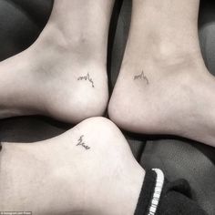 three people with small tattoos on their feet