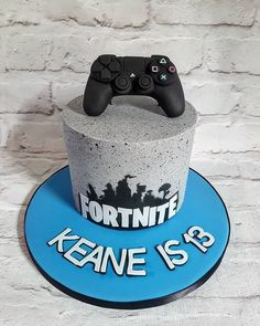 a cake with a video game controller on top