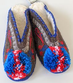 These colourful unisex handmade slippers look fantastic with nice embroidered details, and feel great to wear too. They have a non-slip suede leather sole which is durable and waterproof yet still flexible and breathable. The slippers are made from lamb's wool and lined inside with a soft man-made acrylic fur blend making them very comfortable both with or without socks.  These are the genuine article that have been hand crafted in Greece from the finest materials for generations - just check al Pom Pom Slippers, Greek Gifts, Handmade Slippers, Embroidered Details, Beautiful Embroidery, Embroidered Design, Womens Slippers, Suede Leather, Open Back