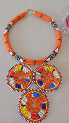 ON SALE African Zulu Pendant Necklace, African Beaded Necklace, Orange African Jewelry, Tribal Neckl African Jewelry Diamond, Cultural Jewelry, African Beaded Necklace, African Jewellery, Homemade Necklaces, Seashell Bracelet, Cowrie Shell Necklace, Necklace African, Necklace Orange