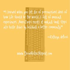 a computer keyboard sitting on top of a yellow wall next to a quote from kathy debos