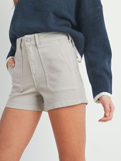 Introducing the Just Black Moonstone High Rise Utility Cargo Short, perfect for the modern woman seeking both style and practicality. With a utility-inspired design and high rise fit, these shorts combine functionality with a boho-inspired creamy neutral colorway. Just Black Denim Creamy neutral coloration Utility inspired pockets Longer inseam 93% Cotton, 3% Elasterel-P, 1% Cotton High Rise Utility Shorts With Cargo Pockets, High-rise Relaxed Fit Utility Shorts, High Rise Relaxed Fit Utility Shorts, Mid-rise Utility Shorts With Side Pockets, Utility High Rise Shorts With Cargo Pockets, Utility Mid-rise Shorts With Side Pockets, High Rise Utility Shorts With Side Pockets, Utility High Rise Shorts With Side Pockets, Mid-rise Workwear Shorts With Pockets