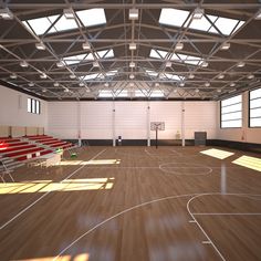 an indoor basketball court with wooden floors and white walls