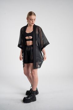 This is the perfect outfit for your next rave. Designed and produced in Berlin, made to order. One size Stretch Open Front Summer Outerwear, Black Summer Streetwear Outerwear, Black Summer Outerwear For Streetwear, Black Relaxed Fit Summer Outerwear, Black Relaxed Fit Outerwear For Summer, Spring Black Sheer Outerwear, Casual Black Summer Outerwear, Black Oversized Outerwear For Festivals, Summer Party Tops With Open Front