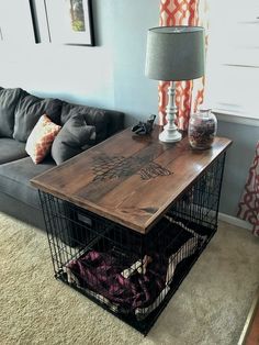 a living room with a gray couch and wooden table in front of a grey sofa