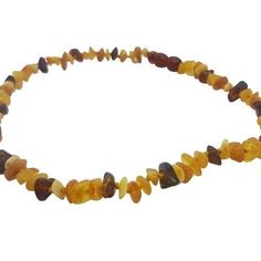 a multicolored beaded necklace on a white background