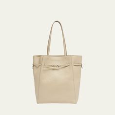 Givenchy "Voyou" north-south tote bag in calf leather  Shoulder straps  Open top with center adjustable buckle strap  Approx. 15"H x 11.8"W x 4.3"D Made in Italy North South, Tumbling, Tote Handbags, Givenchy, Calf Leather, 3 D, Buckle, Tops Designs, Handbags