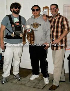 three men standing next to each other in front of a white door with the words coolest homemade costumes on it