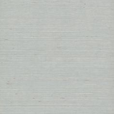 an area rug that is made up of light blue fabric