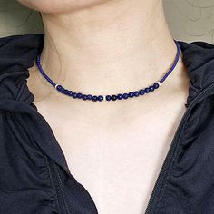 Simple and beautiful choker necklace made with 4mm lapis lazuli beads and cobalt blue Miyuki seed beads, accented with sparkling stardust finish 925 sterling silver beads. 925 Sterling silver lobster claw clasp.  Lapis Lazuli is often used for enhancing communication, promoting self-expression, and encouraging emotional healing. It also enhances spiritual growth, intuition, and inner wisdom. Lapis lazuli is thought to have calming and stress-relieving effects and can aid in improving focus and mental clarity. See more gemstone necklaces from my store: https://www.etsy.com/shop/FayFayJewelry?ref=dashboard-header&section_id=50366104 Visit my store for more unique handmade beaded jewelry: https://fayfayjewelry.etsy.com All jewelry pieces in this store are designed and handmade by myself. Plea Minimalist Blue Beads For Gift, Blue Lapis Lazuli Necklace With Spacer Beads, Blue Gemstone Beads Choker Necklace, Blue Gemstone Beaded Minimalist Necklace, Blue Lapis Lazuli Crystal Necklaces With Round Beads, Blue Lapis Lazuli Beaded Necklaces, Adjustable Lapis Lazuli Crystal Necklace, Blue Lapis Lazuli Round Beads Crystal Necklace, Blue Lapis Lazuli Gemstone Beaded Necklaces