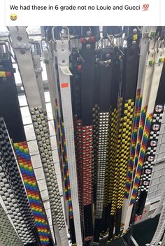 some skis are lined up and ready to be sold in the store for sale