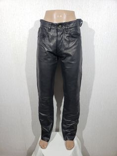 Stylish black leather men's pants. Reliable leather pants. Pants are made of reliable, durable genuine leather. The pants have two front pockets and two back pockets and one small one above the right front pocket. The corners of the pockets have metal rivets. Pants are sewn in denim style. Pants are fastened with metal buttons. The pants have a pleasant polyester lining. Pants are nice, reliable and comfortable to wear, they will perfectly emphasize your style and help you feel comfortable and confident. MEASUREMENTS Pants length                                   109 cm  |  43 in Length inside leg                            84 cm   |  33 in                                                               Waist circumference                        74 cm  |  29 in Hips circumference Black Straight Leg Leather Pants With Pockets, Black Leather Full-length Jeans, Biker Leather Pants With Standard Cut Leg, Biker Leather Pants Straight Leg, Black Leather Straight Leg Bottoms, Black Leather Biker Pants, Biker Style Black Leather Pants With Standard Cut Leg, Black Biker Leather Pants With Standard Cut Leg, Biker Style Leather Pants