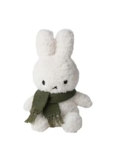 a white stuffed animal with a scarf around it's neck