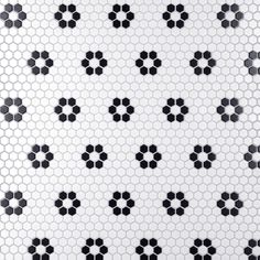 black and white tile with hexagonal designs on it's surface, as well as the pattern in the middle