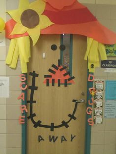 a door decorated to look like a scarecrow