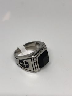 Cool Vintage Rock and Roll star men's ring Nice heavy ring, Silver Stainless Steel Unused stock from the 1980's I have an assortment of sizes from 8, 9, 10, 11, or 12 Please add your size to the order in a message and I will send the size you require. If I am out of stock in your size, I will list the ones I have available for replacement. If I am sold out in the sizes you would prefer, I will cancel and refund you, Thank you All jewelry is shipped in a nice gift box. Check out our over a THOUSA Black Cross Rings For Gift, Steel Cross, Mens Crosses, Vintage Gothic, Vintage Rock, Mens Ring, Cool Vintage, Men's Ring, Ring Silver