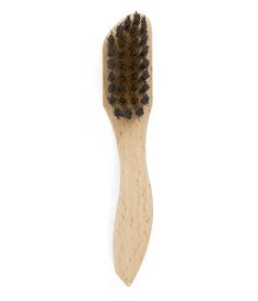 a close up of a wooden brush on a white background